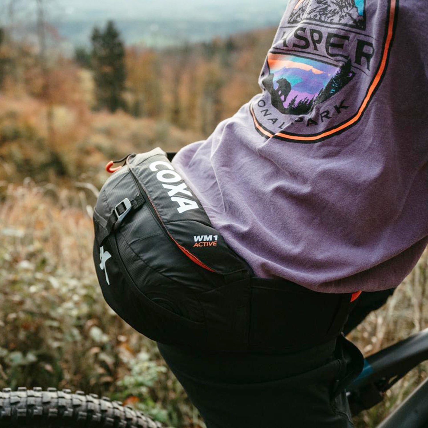 
CoXa WM1 Active Drink belt With 1L Soft Flask - Cyclist side view